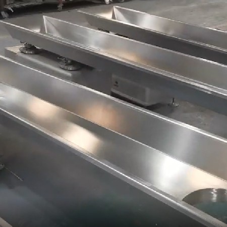 Fast reverse conveyor